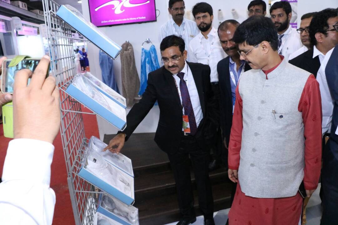 Shri P. C. Vaish, CMD NTCL is giving the information about quality of NTC products to the Honourable Secretary Shri Anant Kumar Singh, IAS, Ministry Of Textile, GOI.